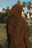 Tan through headscarf hot chocolate
