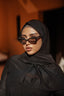 Tan through headscarf