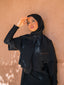 Tan through headscarf