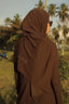 Tan through headscarf hot chocolate